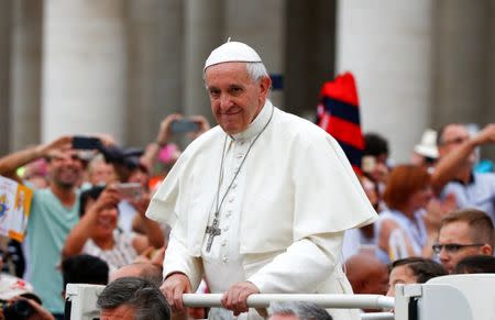 Pope Francis arrives to lead his Wednesday general audience in Saint Peter's square at the Vatican June 28, 2017. REUTERS/Tony Gentile