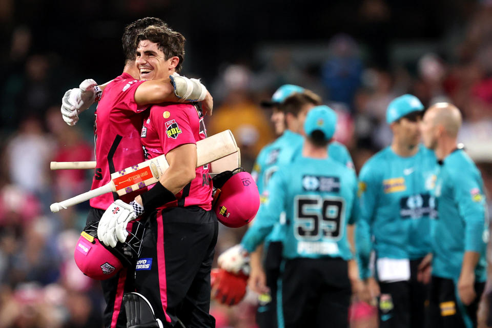 Seen here, Sydney Sixers allrounder Sean Abbott celebrates an extraordinary win against the Brisbane Heat.