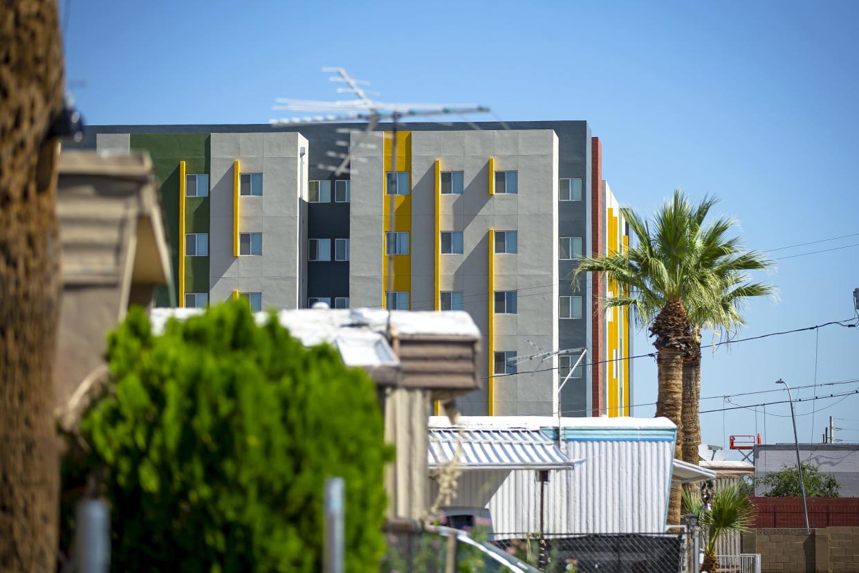 Student housing for Grand Canyon University students overlooks the mobile homes within Periwinkle Mobile Home Park in Phoenix on May 19, 2022.