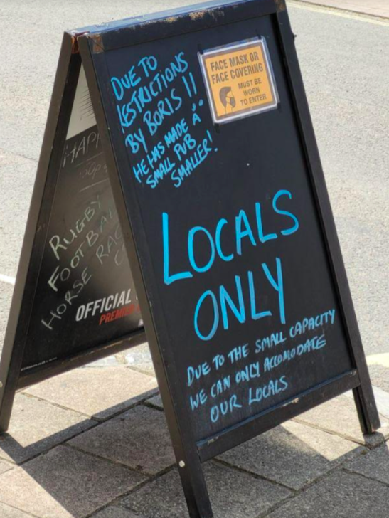 The sign was put up to stop too many people attempting to enter the pub. (Reach)