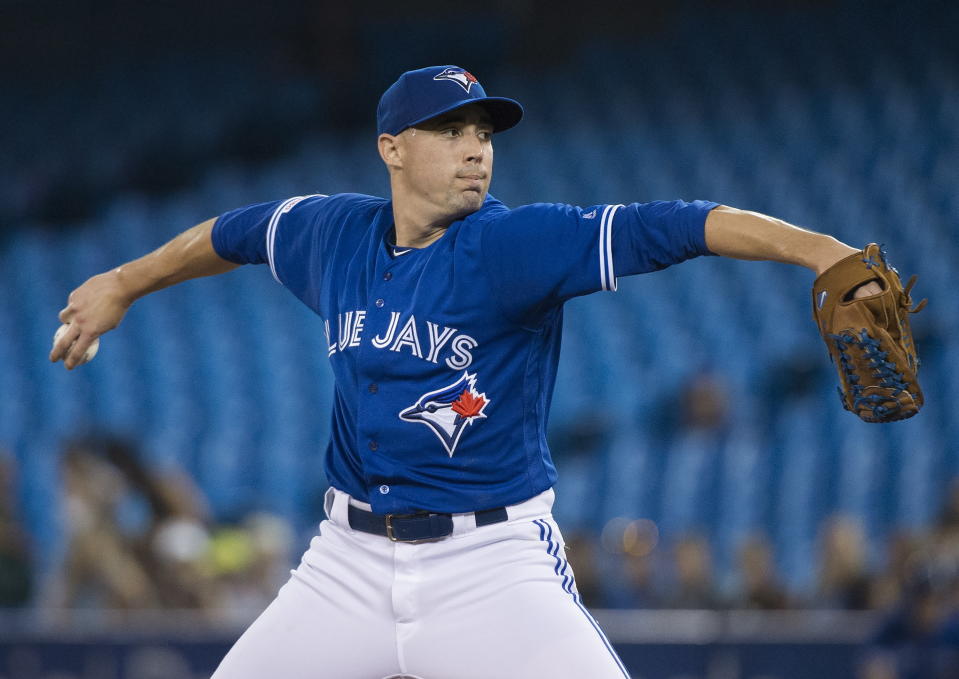 Toronto Blue Jays starting pitcher Aaron Sanchez works during first-inning baseball game action against the Tampa Bay Rays in Toronto, Sunday, July 28, 2019. (Nathan Denette/The Canadian Press via AP)