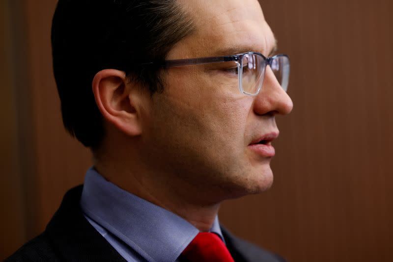 FILE PHOTO: Conservative party leadership candidate Pierre Poilievre speaks to journalists on Parliament Hill in Ottawa