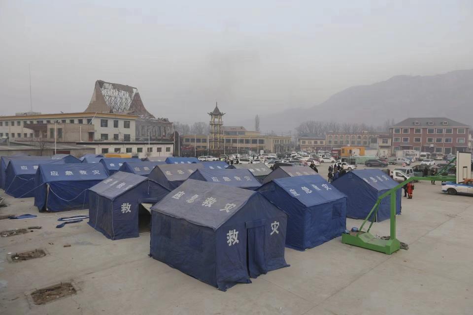 Tents are set up for residents in the aftermath of an earthquake in Dahejia village of Jishishan county in northwestern China's Gansu province Tuesday, Dec. 19, 2023. An overnight earthquake killed multiple people in a cold and mountainous region in northwestern China, the country's state media reported Tuesday.(Chinatopix via AP)