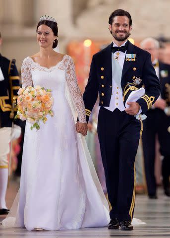 <p>Julian Parker/UK Press via Getty</p> Princess Sofia and Prince Carl Philip leave their wedding ceremony at the Royal Chapel at the Royal Palace on June 13, 2015 in Stockholm.
