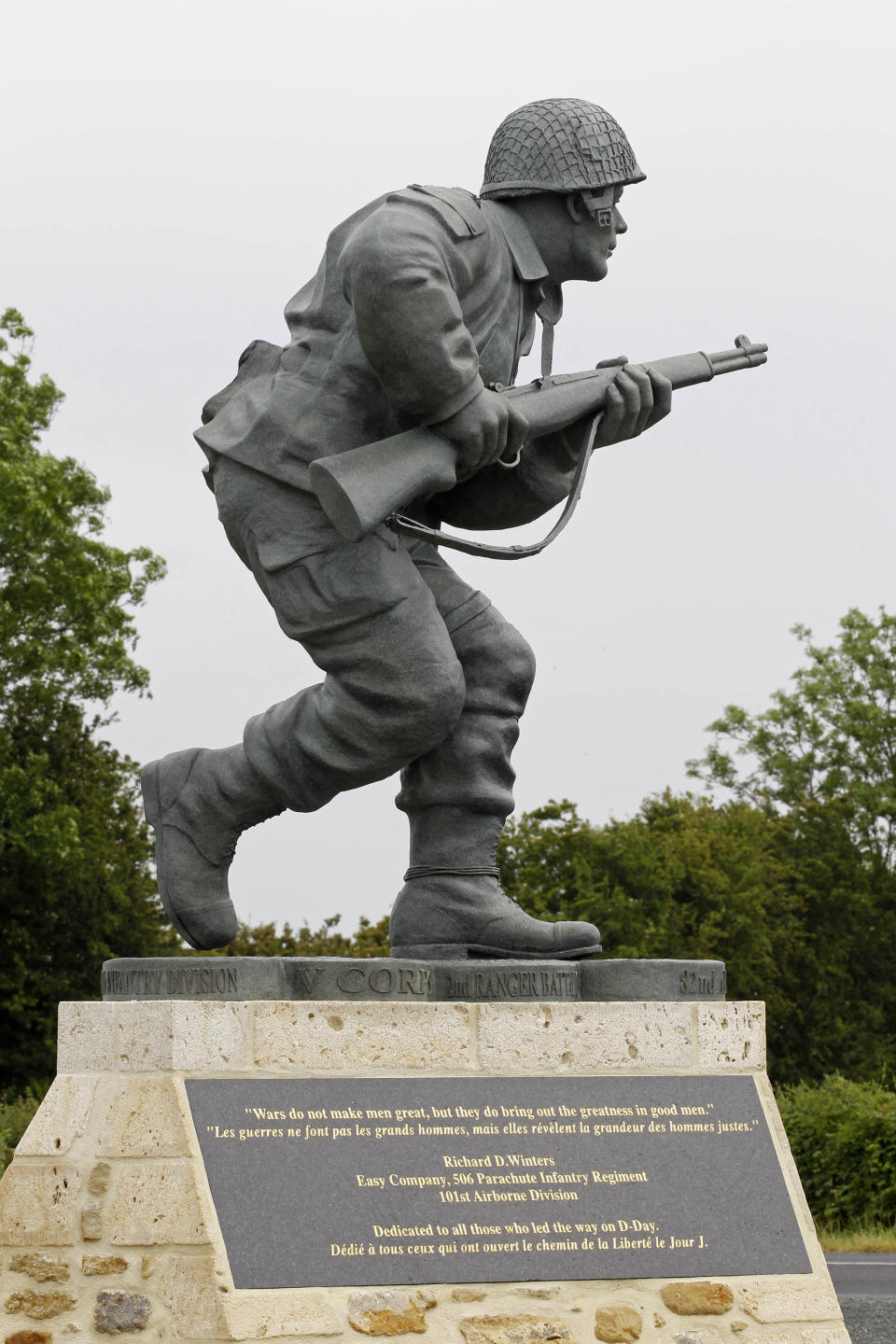 In this picture taken on Tuesday, June 5, 2012, shows the Colorado-made statue of Pennsylvania native Maj. Dick Winters, unveiled on Wednesday, June 6, 2012 near the beaches where the D-Day invasion of France began in 1944, one of many events marking the 68th anniversary of D-Day, the Allied operation that paved the way for the end of the war. The bronze statue built near the village of Sainte Marie du Mont, is a tribute to a man whose quiet leadership was chronicled in the book and television series "Band of Brothers." (AP Photo/Remy de la Mauviniere)