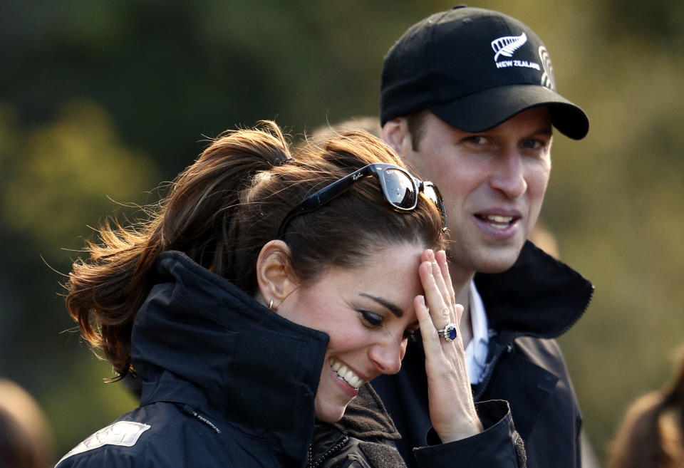 Catherine, Duchess of Cambridge, and her husband, Britain's Prince William, laugh before taking a jet-boat ride on the Shotover River in Queenstown April 13, 2014. Prince William and his wife are undertaking a 19-day official visit to New Zealand and Australia with their son, Prince George. REUTERS/Phil Noble (NEW ZEALAND - Tags: ROYALS SOCIETY)