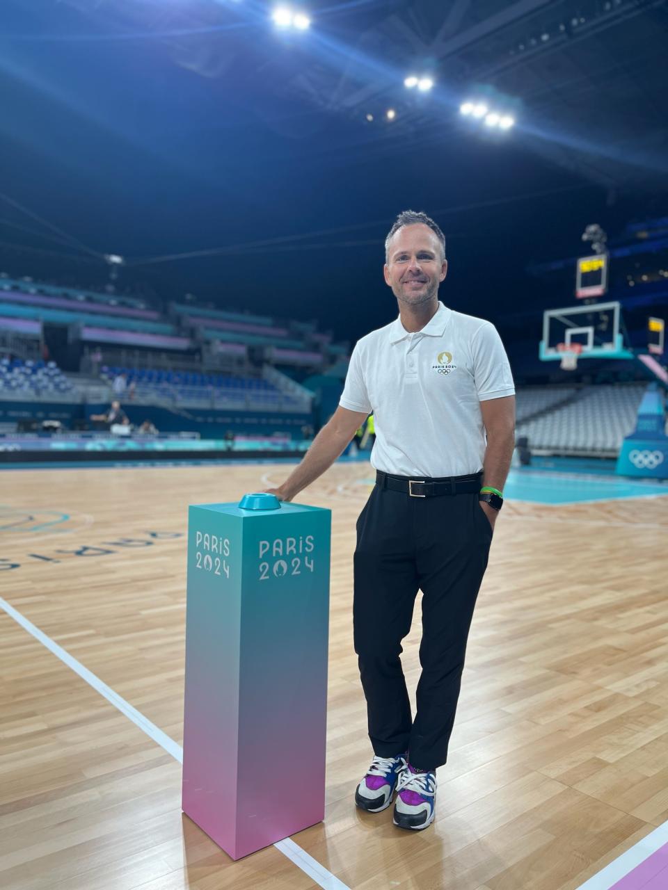 Johnny Watson, the Bucks' executive producer of broadcast and live events, is show-calling, aka producing, the in-arena presentations for the 2024 Paris Olympics men's and women's basketball games.