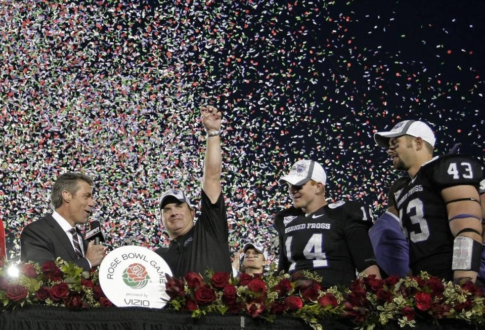 Texas Christian University head coach Gary Patterson, TCU quarterback Andy Dalton (14) and linebacker Tank Carder (43) during the awards ceremony,following TCU’s 21-19 victory over Wisconsin at the Rose Bowl in Pasadena, California, Saturday, January 1, 2011.