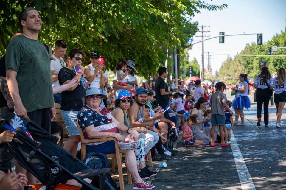 A large crowd watches the Fourth of July parade on Coloma Road in Rancho Cordova on Thursday.