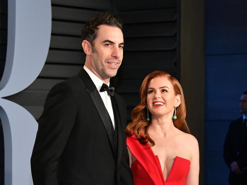 Sacha Baron Cohen and Isla Fisher at the 2018 Vanity Fair Oscar party (Dia Dipasupil/Getty Images)