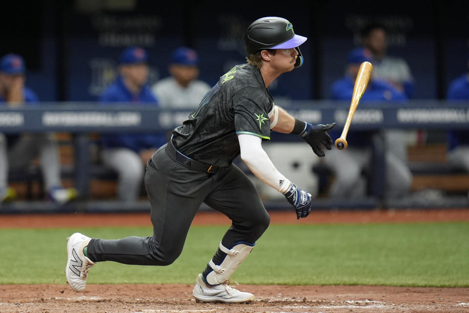 Tampa Bay Rays' Jonny DeLuca watches his game-winning hit off New York Mets relief pitcher Jake Diekman during the 10th inning of a baseball game Sunday, May 5, 2024, in St. Petersburg, Fla. (AP Photo/Chris O'Meara)