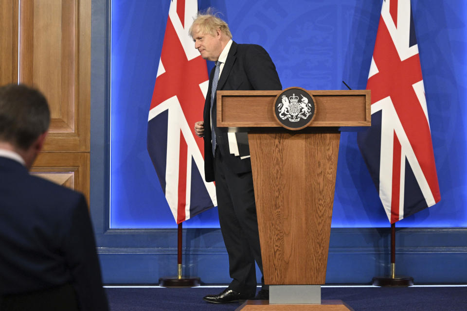 Britain's Prime Minister Boris Johnson speaks during a press conference in Downing Street, London, Wednesday, May 25 2022, following the publication of Sue Gray's report into Downing Street parties in Whitehall. An investigative report blames British Prime Minister Boris Johnson and other senior leaders for allowing boozy government parties that broke the U.K.’s COVID-19 lockdown rules. While Johnson said he took “full responsibility” for the breach, he insisted he would not resign. (Leon Neal/Pool Photo via AP)