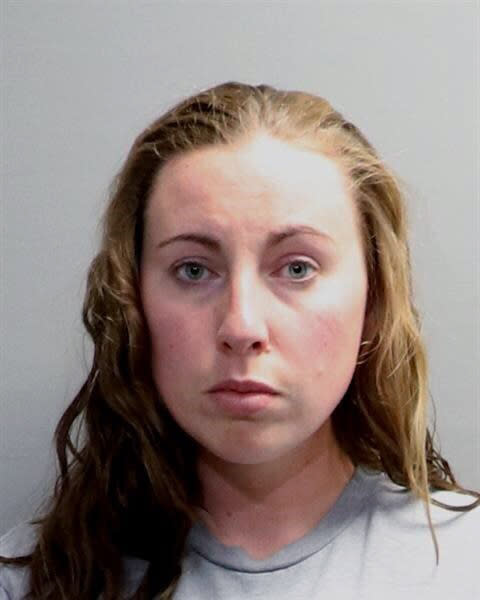 FILE - This booking photo provided by the Oakland County Sheriff's Office shows Jillian Wuestenberg. On Monday, March 13, 2023, criminal charges were dropped against Jillian and Eric Wuestenberg, a white couple charged in 2020 after one of them was captured on video pulling a handgun on a Black woman and her daughters outside a Michigan restaurant. (Oakland County Sheriff's Office via AP, File)