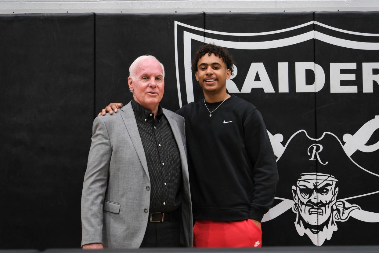 KJ Thomas, right, the all-time leading scorer in Randall basketball history, stands with Coach Leslie Broadhurst Monday at the newly named Leslie Broadhurst Gymnasium at Randall High School.