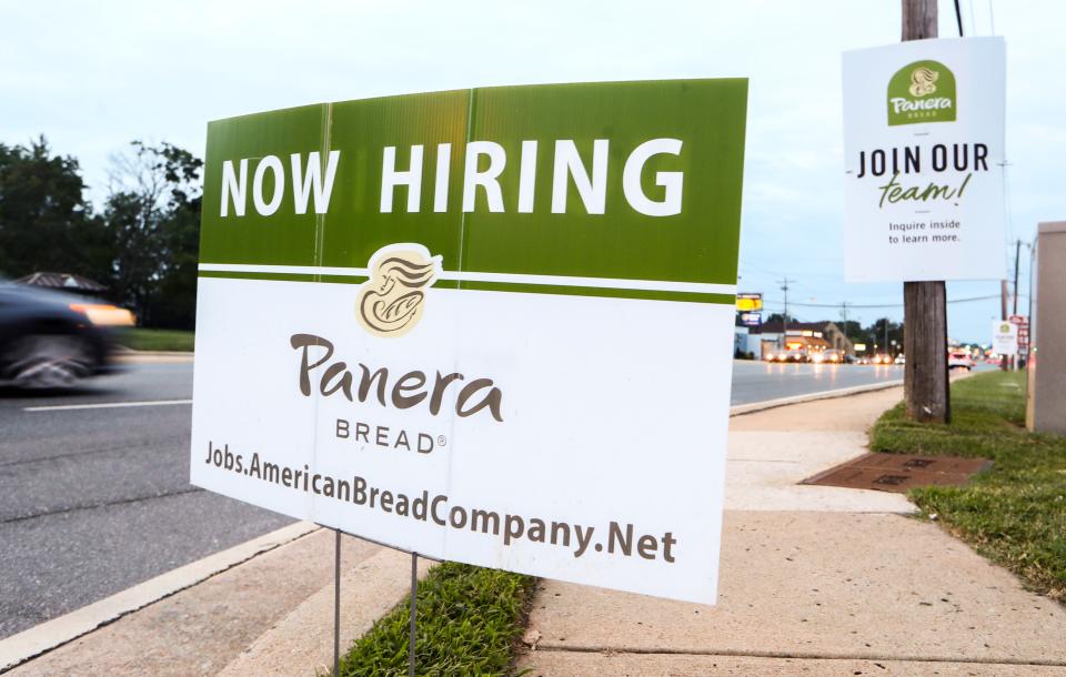 Signs advertise openings at the Panera Bread restaurant in the Fairfax Shopping Center on Concord Pike Tuesday, August 31, 2021.