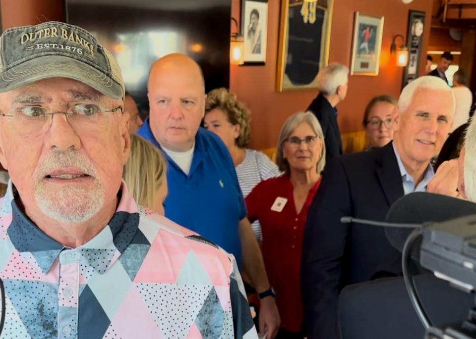 PHOTO: Tom Loughlin, 77, a registered Independent from Port St. Lucie, Florida, speaks to reporters at a meet and greet for former Vice President Mike Pence in North Conway, New Hampshire, on July 21, 2021. (Libby Cathey/ABC News)