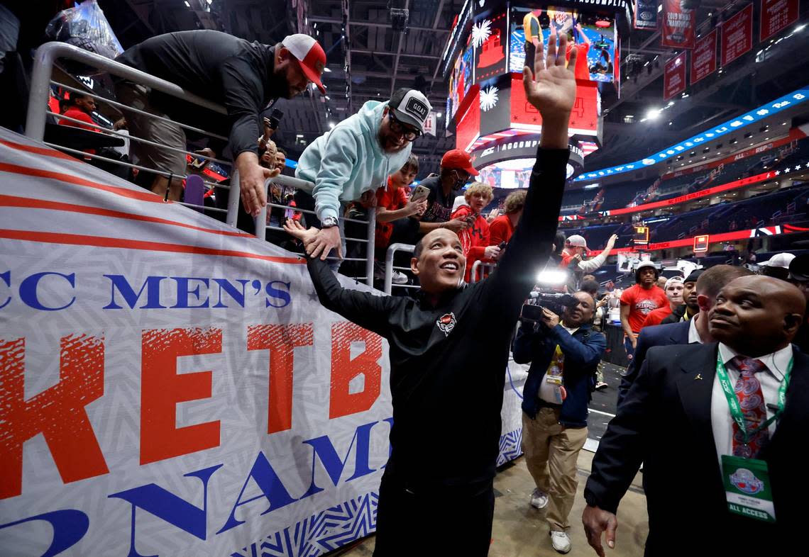 N.C. State head coach Kevin Keatts acknowledges the crowd as he heads off the floor after N.C. State’s 84-76 victory over UNC in the championship game of the 2024 ACC Men’s Basketball Tournament at Capital One Arena in Washington, D.C., Saturday, March 16, 2024.