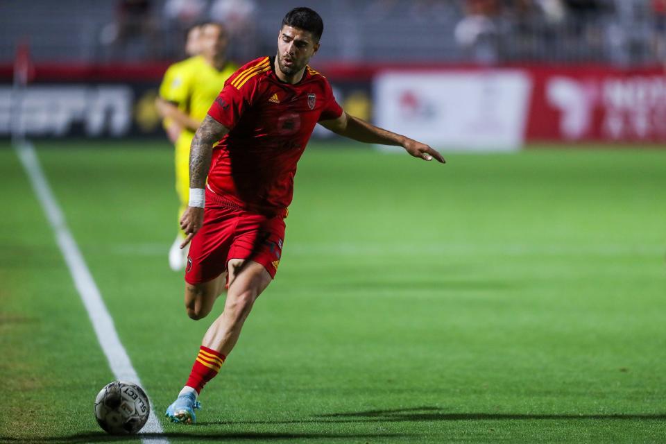 Phoenix Rising FC forward Claudio Repetto (45) dribbles the ball out of bounds during the first half against New Mexico United on Saturday, April 16, 2022, in Chandler. Rising beat the United 1-0 after a fist half goal and a late penalty kick stop by Phoenix Rising FC goalkeeper Ben Lundt (39).