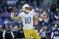 Los Angeles Chargers quarterback Justin Herbert throws a pass against the Baltimore Ravens during the first half of an NFL football game, Sunday, Oct. 17, 2021, in Baltimore. (AP Photo/Gail Burton)