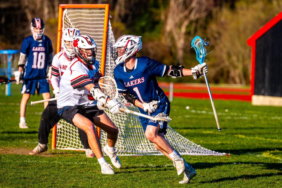 Apponequet's Will Levrault moves around the field.