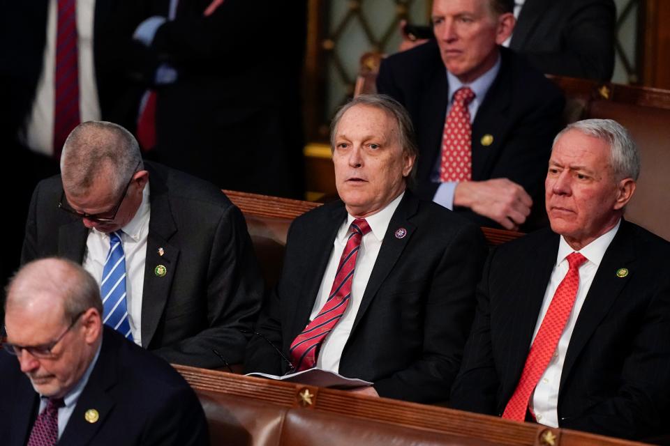 Rep. Andy Biggs, R-Ariz., listens as votes are cast for the next Speaker of the House on the opening day of the 118th Congress at the U.S. Capitol, Tuesday, Jan. 3, 2023, in Washington.