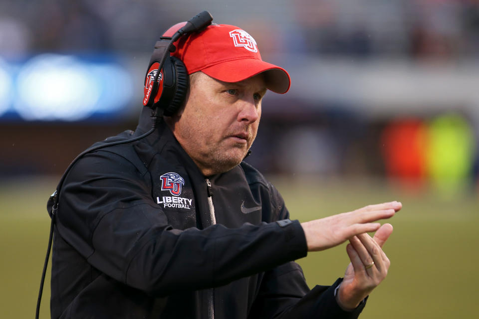 CHARLOTTESVILLE, VA - NOVEMBER 23: Head coach Hugh Freeze of the Liberty Flames calls a timeout in the second half during a game against the Virginia Cavaliers at Scott Stadium on November 23, 2019 in Charlottesville, Virginia. (Photo by Ryan M. Kelly/Getty Images)