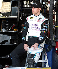 Denny Hamlin ices his knee in April at Phoenix, where he raced 10 days after having reconstructive knee surgery