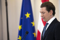 Former Austrian Chancellor Sebastian Kurz announces that he is quitting politics, two months after stepping down as leader amid corruption allegations, during a news conference in Vienna, Austria, Thursday, Dec. 2, 2021. (AP Photo/Lisa Leutner)