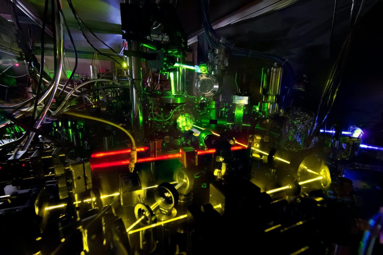 <span class="caption">Mating laser-driven atomic clocks like the one shown here with microwaves promises more accurate electronic devices.</span> <span class="attribution"><a class="link " href="https://www.nist.gov/image/16pml015ytterbiumclocknphillipshrjpeg" rel="nofollow noopener" target="_blank" data-ylk="slk:N. Phillips/NIST;elm:context_link;itc:0;sec:content-canvas">N. Phillips/NIST</a></span>