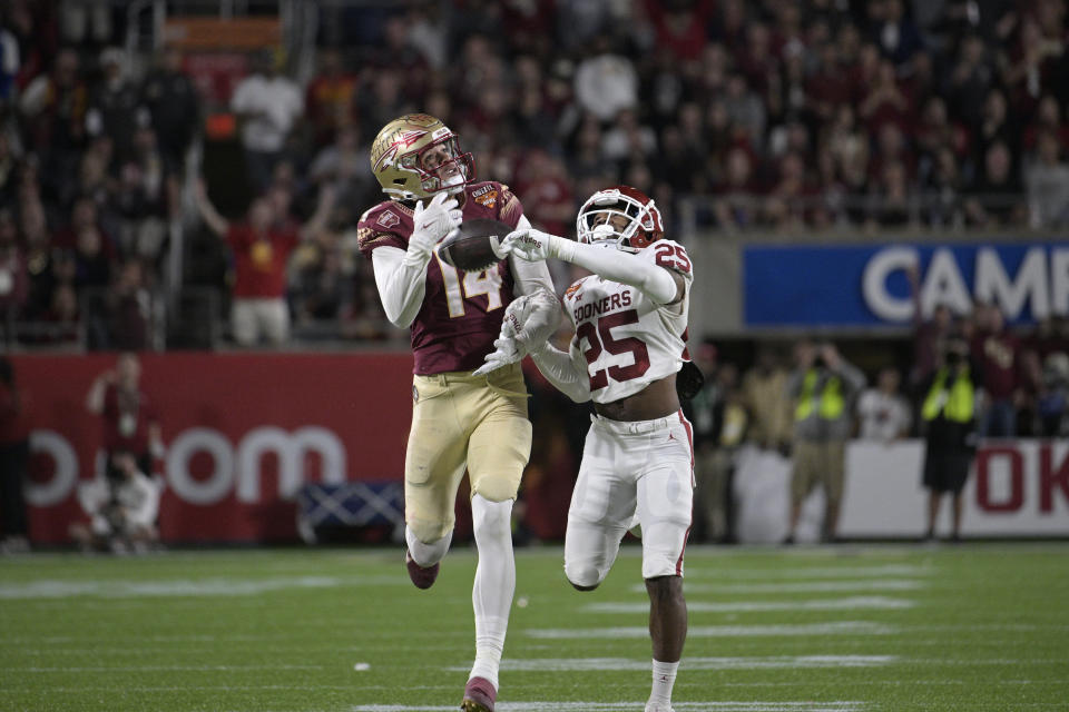 Florida State's offense looks loaded this season with returning players like wide receiver Johnny Wilson (14) one of the key cogs. (AP Photo/Phelan M. Ebenhack)