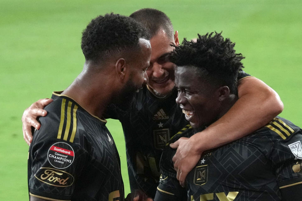 Kwadwo Opoku (right) celebrates with midfielder Kellyn Acosta and defender Aaron Long after scoring a goal against the Philadelphia Union on Tuesday at BMO Stadium. (Kirby Lee-USA TODAY Sports)