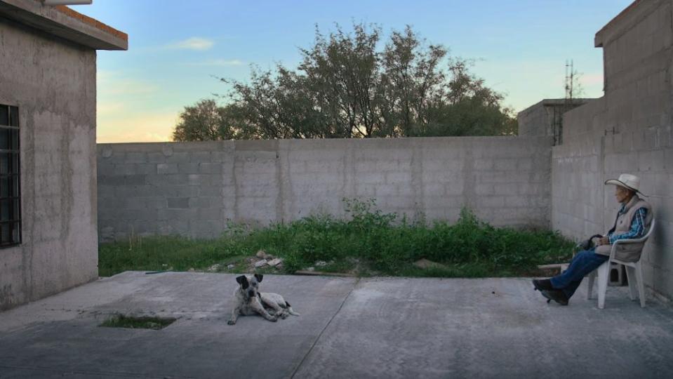 Julián Moreno with his dog Pinto - Credit: Borderchild Productions