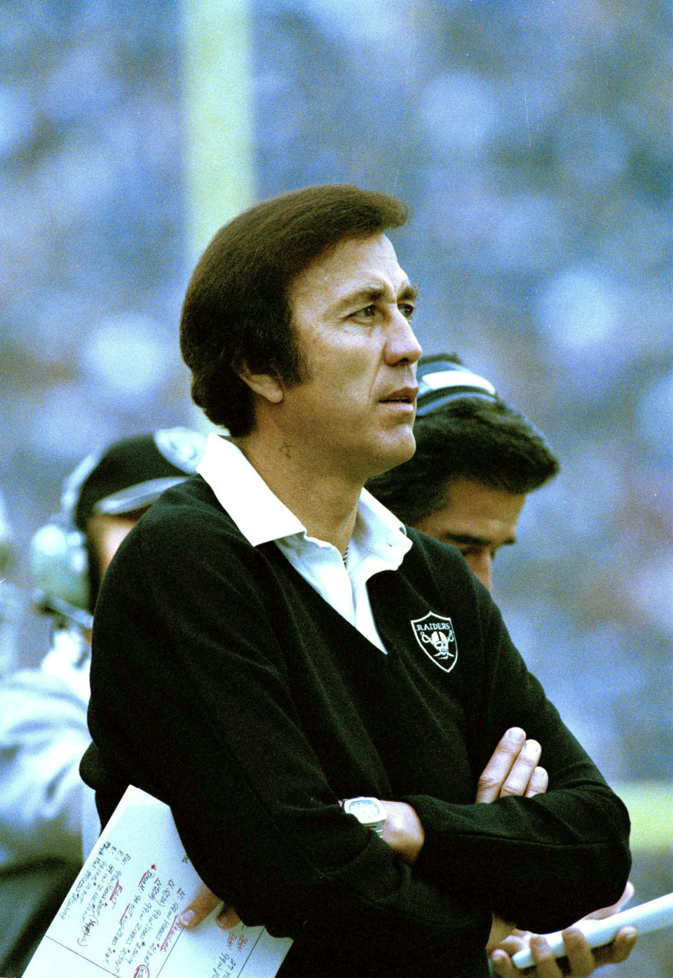 FILE - This 1983 file photo shows Los Angeles Raiders head coach Tom Flores on the sideline during an NFL football game. The AFL gave Flores one last chance when the fledging league launched in 1960 and Flores seized the opportunity. He became the original quarterback of the Raiders before going on to a trailblazing career as a coach and executive that landed him in the Pro Football Hall of Fame following a lengthy wait. (AP Photo/File)