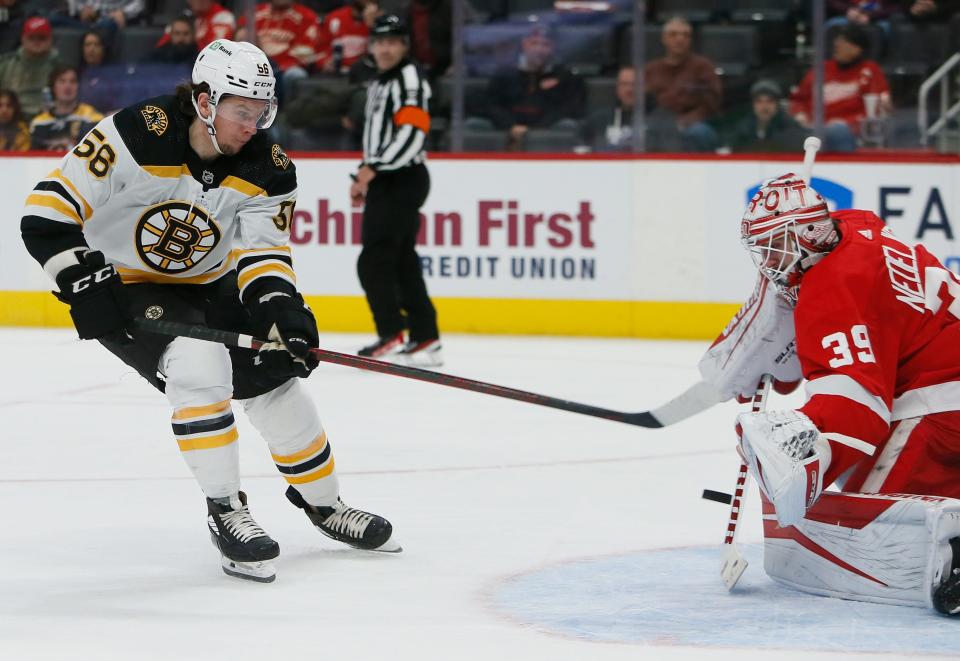 Bruins left wing Erik Haula takes a shot against Detroit Red Wings goaltender Alex Nedeljkovic during the second period of a game Jan. 2 in Detroit.