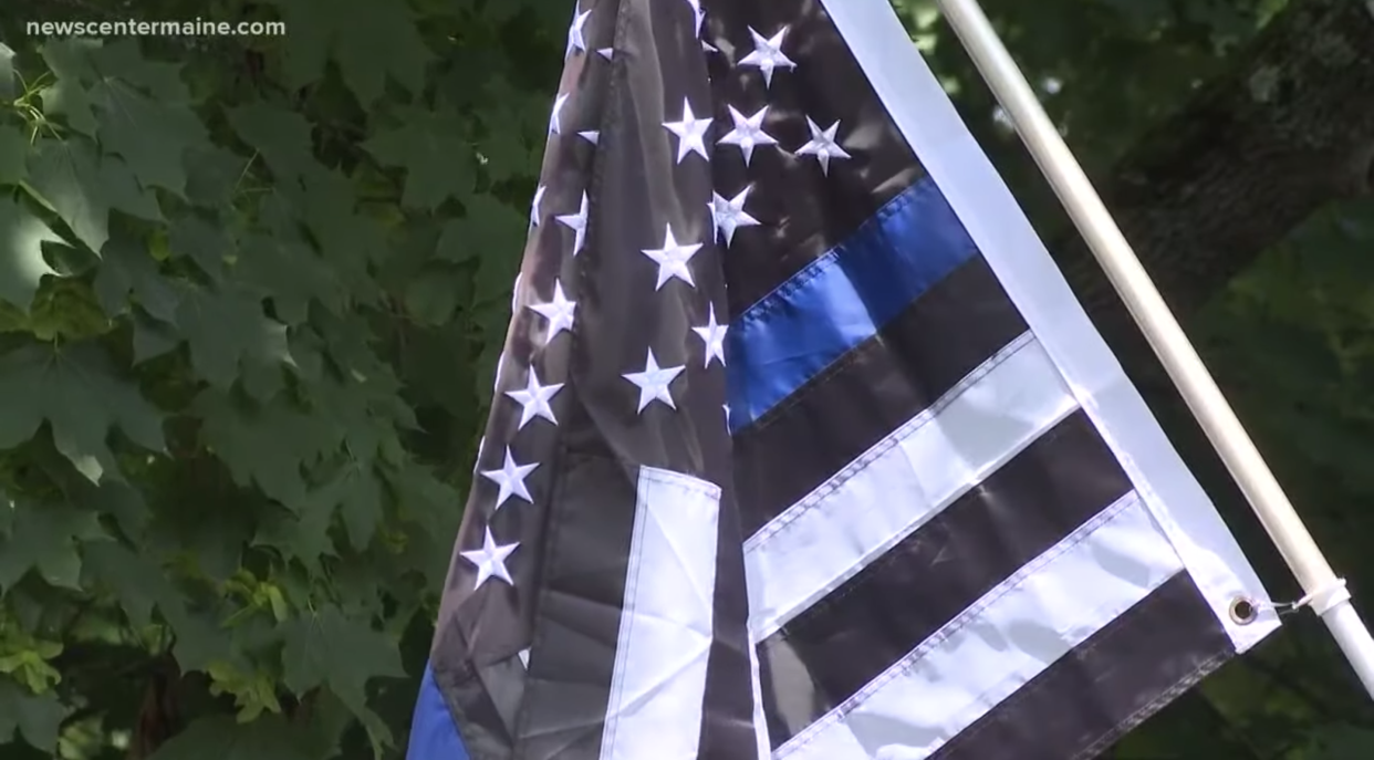 The "Thin Blue Line" American flag that has become associated with the Black Lives Matter movement and was used by white supremacists during the violent Charlottesville, Va. rally has ignited a heated controversy in York, Maine. (Credit: New Center Maine)