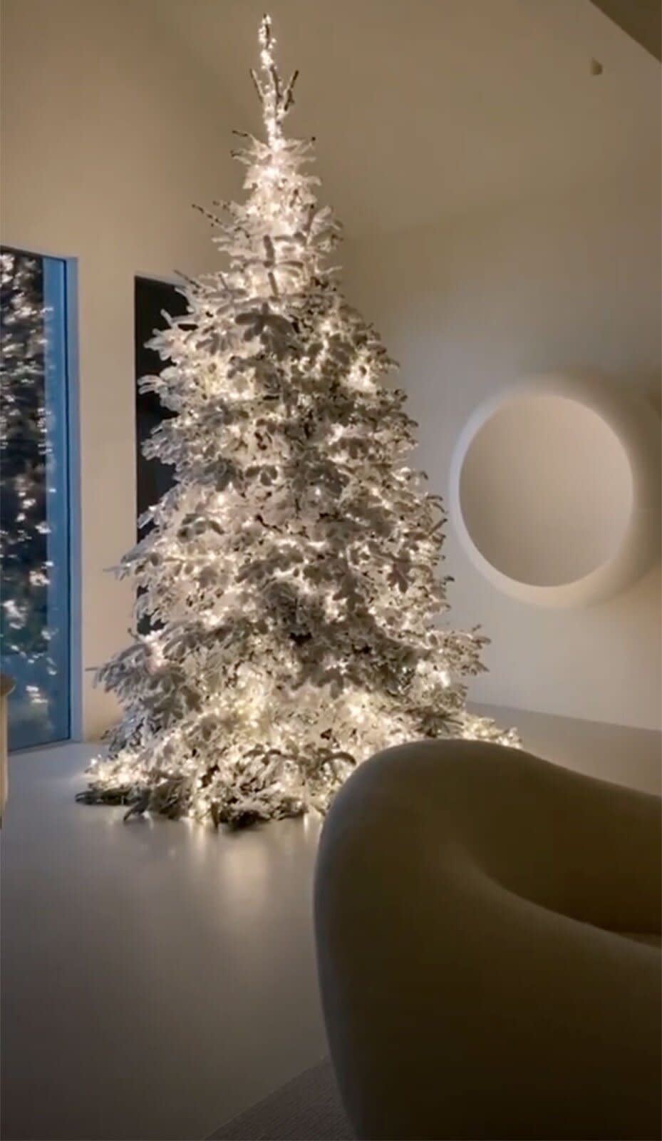 Evergreen is not a shade found in Kim's decor, so her Christmas tree was sprayed white before being strung with white lights. 