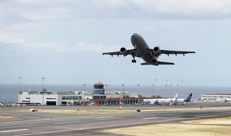 A German Air Force medical airplane takes off with the injured German tourists involved in a bus accident onboard, at Cristiano Ronaldo Airport in Funchal, on the Portuguese Island of Madeira, April 20, 2019. REUTERS/Rafael Marchante