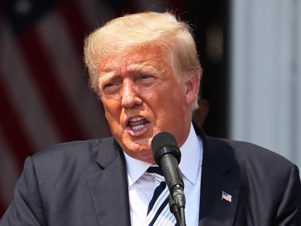 Former US President Donald Trump speaks during a press conference announcing a class action lawsuit against big tech companies at the Trump National Golf Club Bedminster on 7 July 2021 (Getty Images)