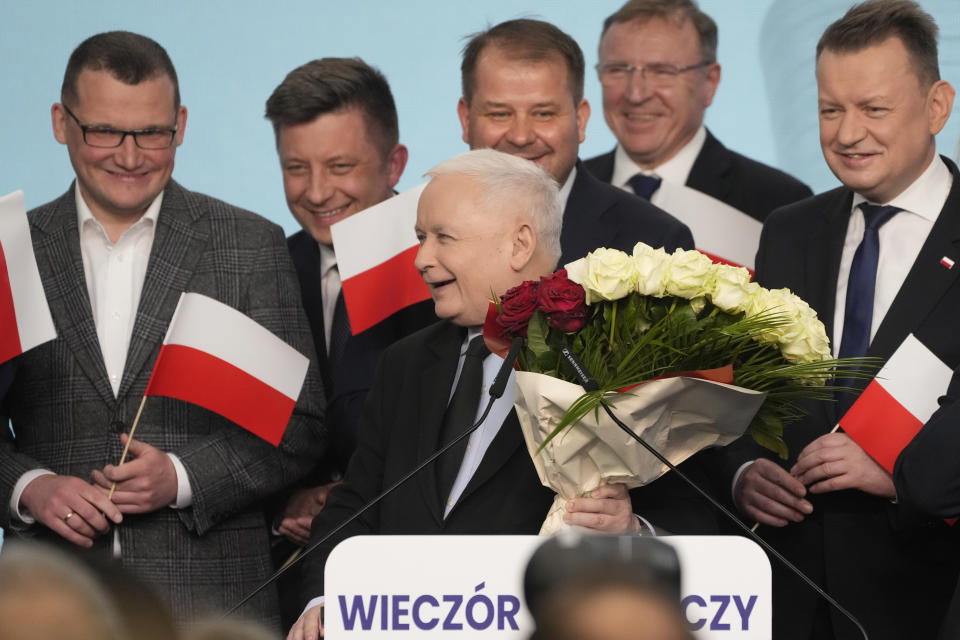 Conservative Law and Justice party leader Jaroslaw Kaczynski, centre, declared victory in Poland's local and regional elections in Warsaw, Poland, on Sunday, April 7, 2024. The exit polls have a small margin of error and final results are not expected until Monday. The vote is the first test at the ballot box for Prime Minister Donald Tusk four months after he took office. (AP Photo/Czarek Sokolowski)