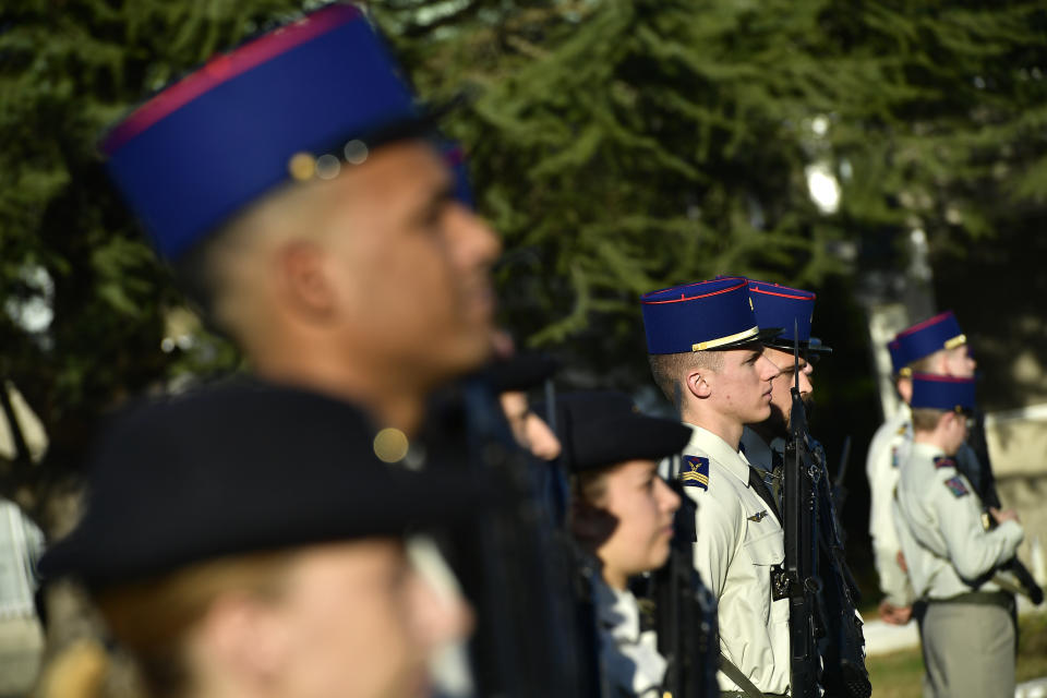 French soldiers attends a ceremony in tribute to French soldiers who died in Mali helicopter crash, Monday Jan.13, 2020 in Pau, southwestern France. France is preparing its military to better target Islamic extremists in a West African region that has seen a surge of deadly violence. (AP Photo/Alvaro Barrientos, Pool)