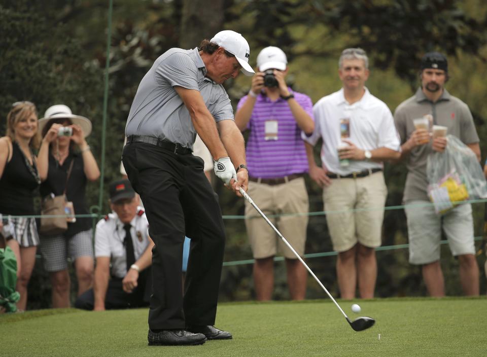 Phil Mickelson of the U.S. hits off the 15th tee during his practice round ahead of the 2015 Masters at Augusta National Golf Course in Augusta, Georgia April 8, 2015. REUTERS/Brian Snyder