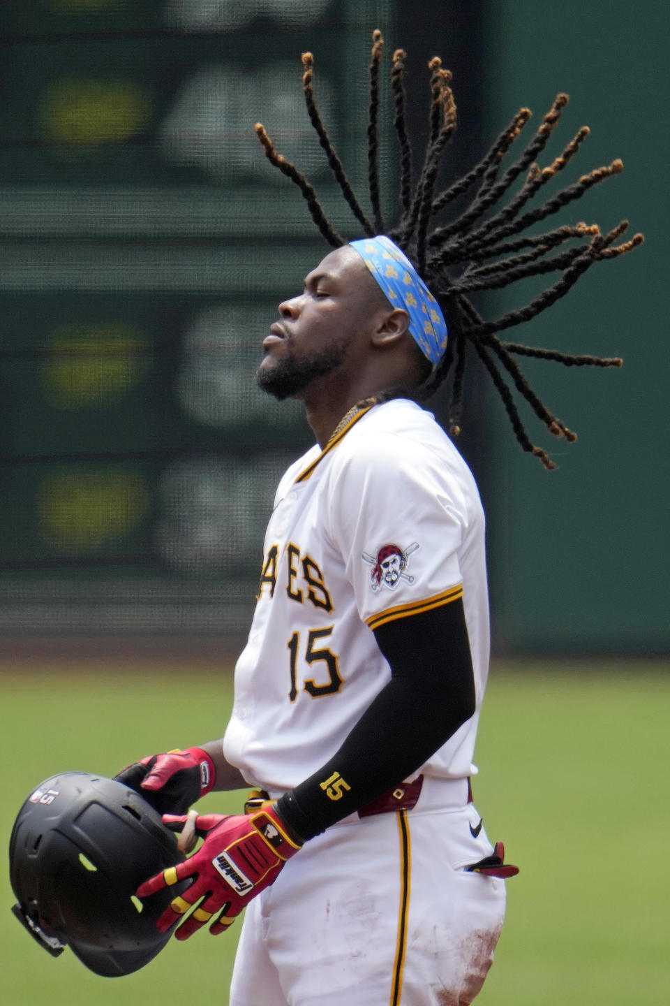 Pittsburgh Pirates' Oneil Cruz stands on second base after stealing the base during the first inning of a baseball game against the St. Louis Cardinals in Pittsburgh, Thursday, July 4, 2024. (AP Photo/Gene J. Puskar)