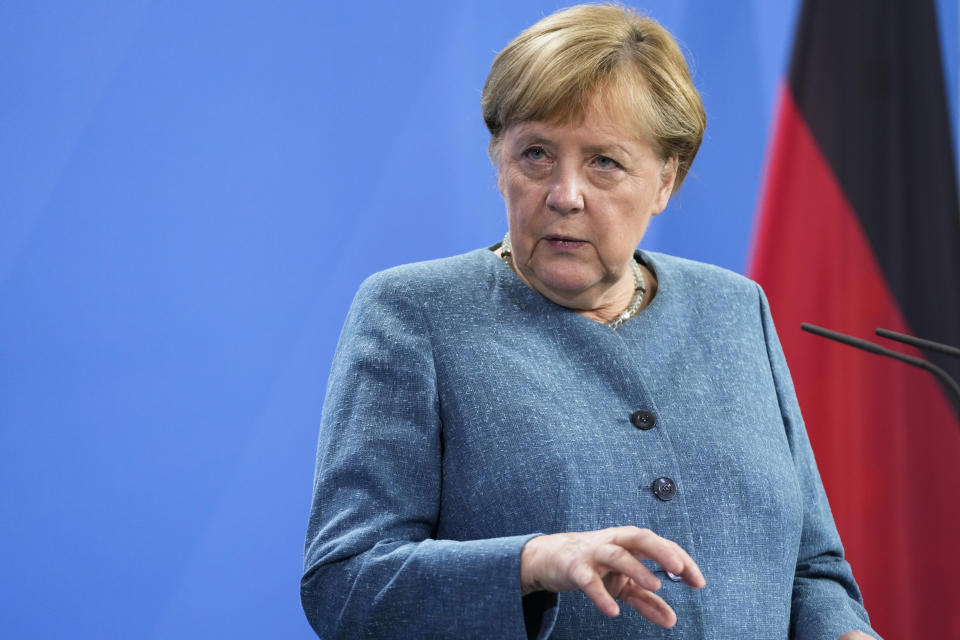 German Chancellor Angela Merkel attends a news conference with Austria's Chancellor Sebastian Kurz prior to a meeting at the chancellery in Berlin, Germany, Tuesday, Aug. 31, 2021. (AP Photo/Markus Schreiber, Pool)