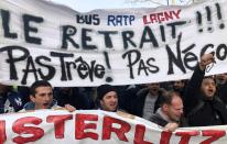 French labour union members and workers on strike attend a demonstration in Paris