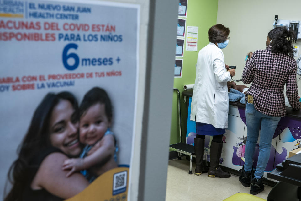 Dr. Acklema Mohammad Director of Pediatrics at Urban Health Plan checks a patient at El Nuevo San Juan Health Center in the Bronx borough in New York, Thursday, Jan. 11, 2024. Mohammad started 50 years ago as a medical assistant in Urban Health Plan’s first clinic, San Juan Health Center. She has cared for some families across three generations. “It’s so gratifying to work in this community. I’m walking through the door, or I’m walking down the street, and I’m getting hugs,” she said. “All along, ‘Oh Dr. Mo! You’re still here!’” (AP Photo/Eduardo Munoz Alvarez)