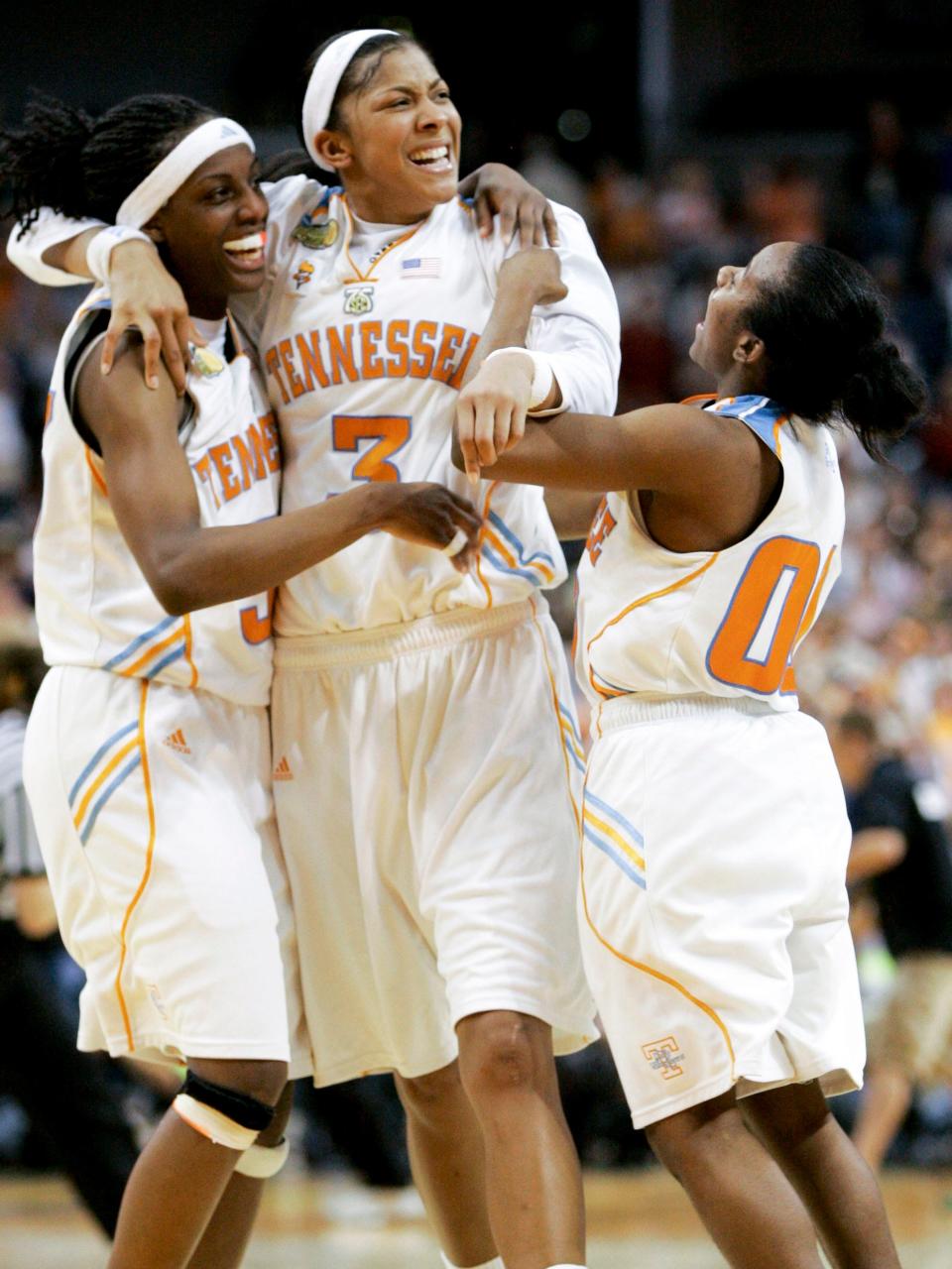 Tennessee's Alberta Auguste, left, Candace Parker (3) and Shannon Bobbitt celebrate Tennessee's 47-46 win over LSU in an NCAA women's basketball tournament Final Four semifinal, Sunday, April 6, 2008, in Tampa, Fla. Tennessee will play Stanford for the national championship Tuesday night. (AP Photo/Amy Sancetta)