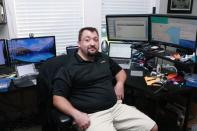 Jay Radcliffe poses at his home office in Meridian, Idaho October 10, 2014. REUTERS/Brian Losness