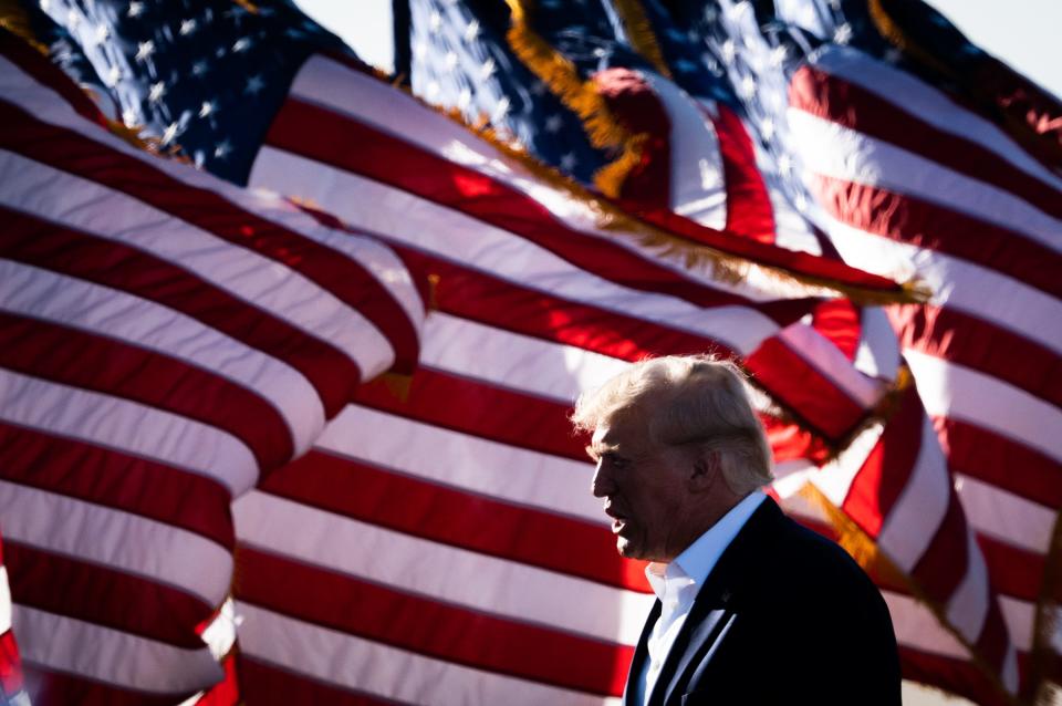 Former President Donald Trump takes the stage Saturday in Waco for a speech in which he criticized criminal investigations of his actions and promised to be an agent of "retribution" if he is elected president again.