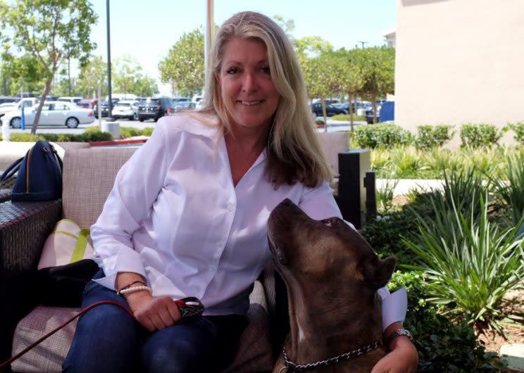 Architect turned Democratic candidate Laura Oatman and her dog Gracie at a café near her home in Newport Beach, Calif.