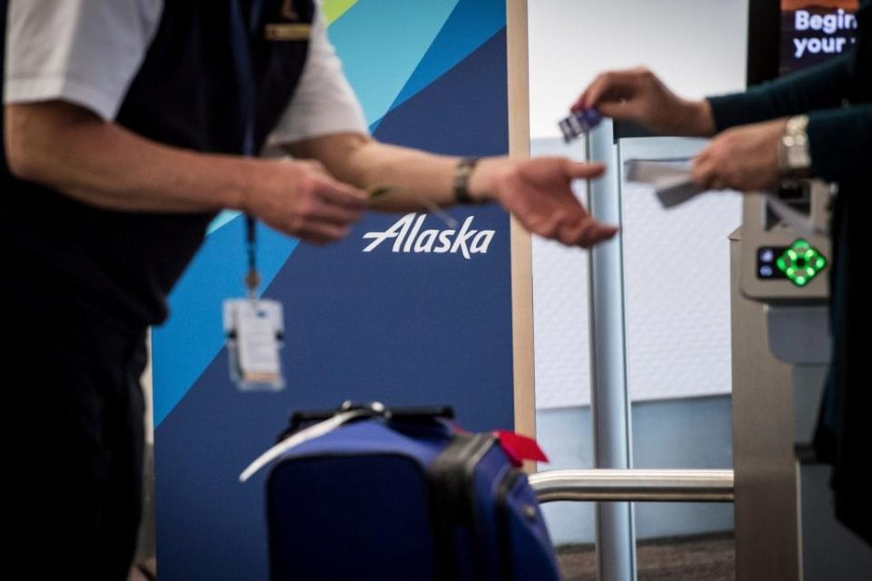 American and Alaska Airlines Cut Back Loyalty Ties